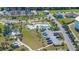 Aerial view showcasing the community park, recreation facilities, and green spaces at 13608 S Village Dr # 6203, Tampa, FL 33618