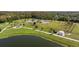 Community park aerial view showcasing dog park, walking paths and green spaces at 13608 S Village Dr # 6203, Tampa, FL 33618