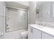 Well-lit bathroom with shower-tub combination and white vanity at 13608 S Village Dr # 6203, Tampa, FL 33618