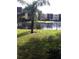 Peaceful lake view with lush landscaping at 14130 Rosemary Ln # 2102, Largo, FL 33774