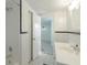 Clean bathroom with a shower and double vanity at 1428 Illinois Ave, Palm Harbor, FL 34683