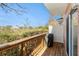 Wooden deck with grill and view of backyard at 2066 Sun Down Dr 2066 Sun Down Dr, Clearwater, FL 33763