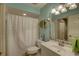 Clean bathroom with shower/tub combo, and updated vanity at 4452 Weybridge St # 74, Sarasota, FL 34235