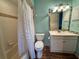 Clean bathroom with a shower/tub combo and white vanity at 4452 Weybridge St # 74, Sarasota, FL 34235