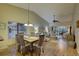 Bright dining area with hardwood floors and a view to the living room at 4452 Weybridge St # 74, Sarasota, FL 34235