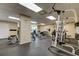 Well-equipped gym featuring a variety of exercise machines and free weights at 7050 Sunset S Dr # 405, South Pasadena, FL 33707