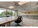 Conference room with a large table, comfortable seating, and picturesque views of the outdoors at 7050 Sunset S Dr # 405, South Pasadena, FL 33707