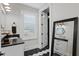 Stylish bathroom with hexagon tile floor and a black and white theme at 1308 W Plymouth St, Tampa, FL 33603