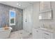 Modern bathroom with marble and gray tile at 1308 W Plymouth St, Tampa, FL 33603