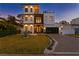 Night view of a contemporary two-story home with attractive landscaping at 1308 W Plymouth St, Tampa, FL 33603