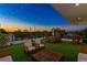 Rooftop deck at sunset with string lights and comfortable seating at 1308 W Plymouth St, Tampa, FL 33603