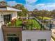 Aerial view of a rooftop deck with artificial turf and outdoor seating at 1308 W Plymouth St, Tampa, FL 33603