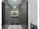 Sleek shower with dark geometric tiles and glass enclosure at 1308 W Plymouth St, Tampa, FL 33603