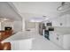 Modern kitchen featuring white cabinets, quartz countertops, and stainless steel appliances at 2308 Long Green Ct, Valrico, FL 33596