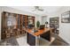 Bright home office features built-in shelves and a large desk at 4901 W Bartlett Dr, Tampa, FL 33603