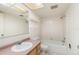 Bathroom with a built-in tub, updated sink and vanity, and recessed lighting at 5110 28Th W St, Bradenton, FL 34207