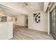 Living room with new floors, base molding, trim accents and slider access to the backyard at 5110 28Th W St, Bradenton, FL 34207