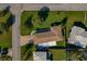 Single story home, large yard, and neighborhood view at 1957 Temple Ter, Clearwater, FL 33764