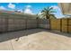 Large fenced-in backyard with concrete patio at 1957 Temple Ter, Clearwater, FL 33764