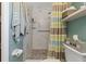 Updated bathroom with a walk-in shower at 1957 Temple Ter, Clearwater, FL 33764