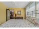 Bedroom with a view into the living room at 1957 Temple Ter, Clearwater, FL 33764