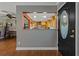 View of kitchen from entryway with passthrough at 1957 Temple Ter, Clearwater, FL 33764