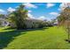 House exterior showcasing a well-manicured lawn at 1957 Temple Ter, Clearwater, FL 33764