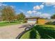Ranch-style home with attached garage at 1957 Temple Ter, Clearwater, FL 33764