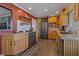 Updated kitchen with granite countertops, stainless steel appliances, and wood cabinets at 1957 Temple Ter, Clearwater, FL 33764