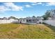 Spacious backyard featuring grassy lawn and detached structure at 6598 26Th N St, St Petersburg, FL 33702