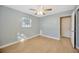 Bright bedroom with ceiling fan and wood-look floors at 6598 26Th N St, St Petersburg, FL 33702