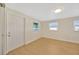 Light and airy bedroom with wood-look floors and exterior access at 6598 26Th N St, St Petersburg, FL 33702