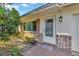 Inviting front entrance of a single-story home with stone accents at 6598 26Th N St, St Petersburg, FL 33702