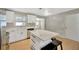 Modern kitchen with white cabinets and a kitchen island at 6598 26Th N St, St Petersburg, FL 33702