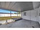 Screened porch with backyard access and additional storage at 6598 26Th N St, St Petersburg, FL 33702