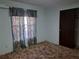 Bedroom with window, closet, and carpet at 2095 59Th N St, Clearwater, FL 33760