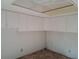 Storage room with overhead cabinets and window at 2095 59Th N St, Clearwater, FL 33760