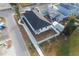 Aerial view of a new home with a backyard and privacy fence at 2513 W Hiawatha St, Tampa, FL 33614