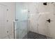 Spa-like shower with marble walls and pebble floor at 2513 W Hiawatha St, Tampa, FL 33614