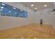 Indoor racquetball court with large window at 1600 Gulf Blvd # 1112, Clearwater, FL 33767