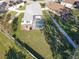 Aerial view showing the house, pool, and large backyard at 4121 70Th Street E Cir, Palmetto, FL 34221