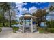 Relaxing gazebo by the lake, perfect for enjoying the view at 4121 70Th Street E Cir, Palmetto, FL 34221