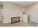 Bright foyer with console table and neutral color palette at 4284 Expedition Way, Osprey, FL 34229