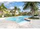 Relaxing community pool with a spacious deck at 4284 Expedition Way, Osprey, FL 34229