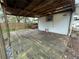 Backyard with wooden deck, covered patio and hot tub at 432 2Nd Ne Ave, Largo, FL 33770