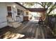 Backyard with a wooden deck and access to the house at 432 2Nd Ne Ave, Largo, FL 33770