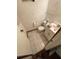 Small bathroom with toilet, sink, and tiled floor at 432 2Nd Ne Ave, Largo, FL 33770