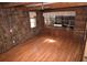 Bedroom with wood-like wall covering and laminate floor at 432 2Nd Ne Ave, Largo, FL 33770