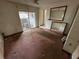 Bedroom with carpet, sliding door, and mirrored wall at 432 2Nd Ne Ave, Largo, FL 33770