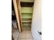 Open closet with wooden shelves at 432 2Nd Ne Ave, Largo, FL 33770